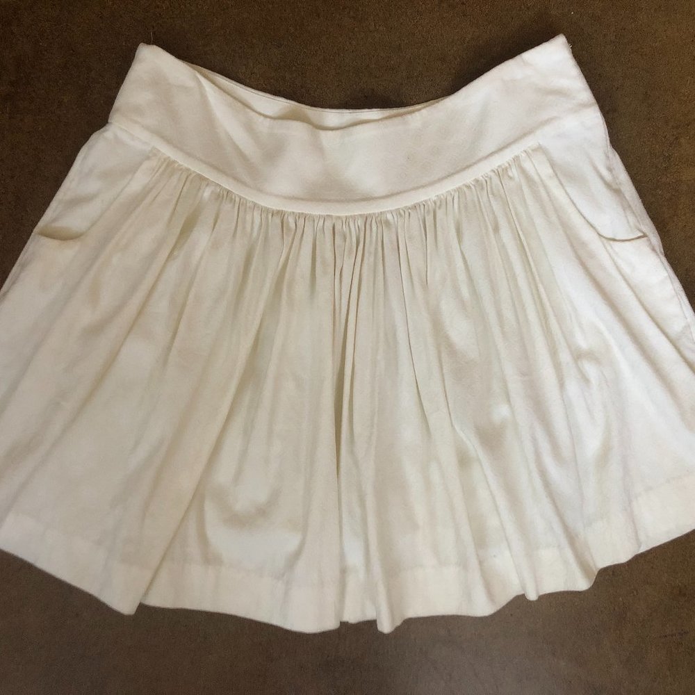 Cream Express skirt with pockets, size 10